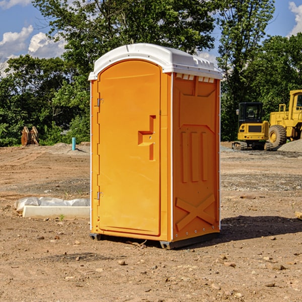 how often are the portable restrooms cleaned and serviced during a rental period in Pass Christian